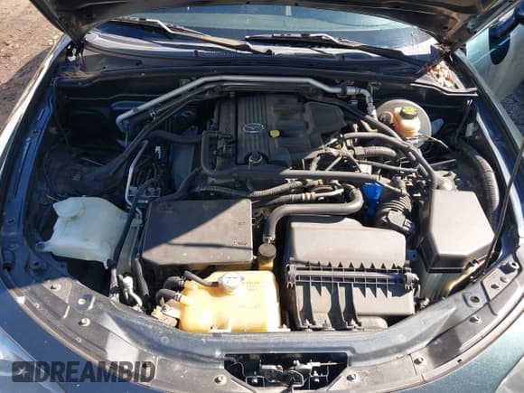 ✅ 2006 Mazda MX-5 Miata Grand Touring • VIN: JM1NC25FX60117258 • Lot: 41586536. Wystawiony na IAAI z przebiegiem 183 676 mil. Bezpłatny archiwum sprzedaży aukcyjnych z USA i szczegółowy raport historii pojazdu na DreamBid. Zdjęcie 10.