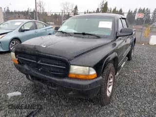 ✅ 2002 Dodge Dakota Sport • VIN: 1B7HL38N82S511989 • Lot: 41517082. Wystawiony na IAAI z przebiegiem 239 490 mil. Bezpłatny archiwum sprzedaży aukcyjnych z USA i szczegółowy raport historii pojazdu na DreamBid. Zdjęcie 2.