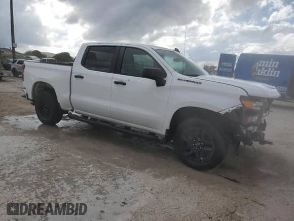 2023 Chevrolet Silverado 1500 Custom with VIN 1GCPABEK7PZ151506, listed as a Copart auction lot 90691455 with 34,591 mi miles and Clean title. Bid and sale history available at DreamBid. Image 4.