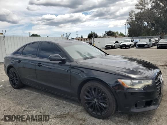 ✅ 2014 Audi A6 Premium • VIN: WAUCFAFCXEN099940 • Lot: 51525485. Listed on Copart with 133,447 mi. Free auction sales archive from the USA and detailed vehicle history report at DreamBid. Image 4.