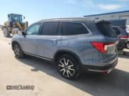 ✅ 2022 Honda Pilot Touring 7-Passenger • VIN: 5FNYF6H68NB077916 • Lot: 84418935. Listed on Copart with 24,400 mi. Free auction sales archive from the USA and detailed vehicle history report at DreamBid. Image 2.