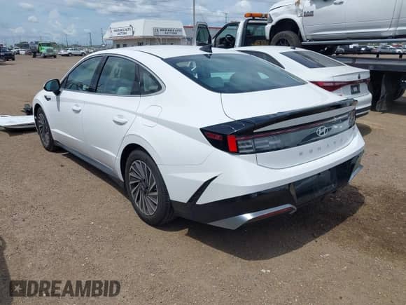 2024 Hyundai Sonata SEL z VIN KMHL34JJ0RA100332, wystawiony jako IAAI lot #42537746 z przebiegiem 8 661 mil mil oraz . Historia ofert i sprzedaży dostępna na DreamBid. Obrazek 3.