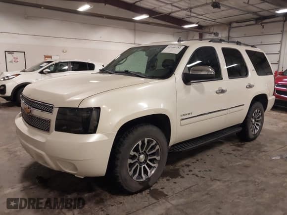 ✅ 2012 Chevrolet Tahoe LTZ • VIN: 1GNSKCE07CR227674 • Lot: 42166732. Listed on IAAI with 204,171 mi. Free auction sales archive from the USA and detailed vehicle history report at DreamBid. Image 2.
