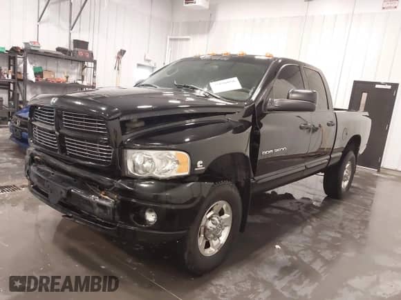 2005 Dodge 3500 SLT z VIN 3D7LS38C85G810265, wystawiony jako IAAI lot #41856058 z przebiegiem 164 027 mil mil oraz . Historia ofert i sprzedaży dostępna na DreamBid. Obrazek 2.