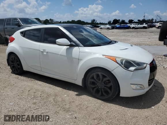 ✅ 2013 Hyundai Veloster RE:MIX • VIN: KMHTC6AD7DU156104 • Лот: 51266135. Размещён на Copart с пробегом 104 374 миль миль. Получите бесплатный доступ к архиву аукционных продаж из США и посмотрите подробный отчёт об истории автомобиля на DreamBid. Изображение 4.