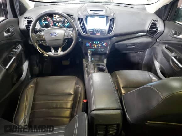 2017 Ford Escape Titanium с VIN 1FMCU9J92HUA12041, выставлен на аукционе Copart как лот 59074775 с пробегом 111 566 миль миль и Списание • Salvage title. История ставок и продаж доступна на DreamBid. Изображение 8.