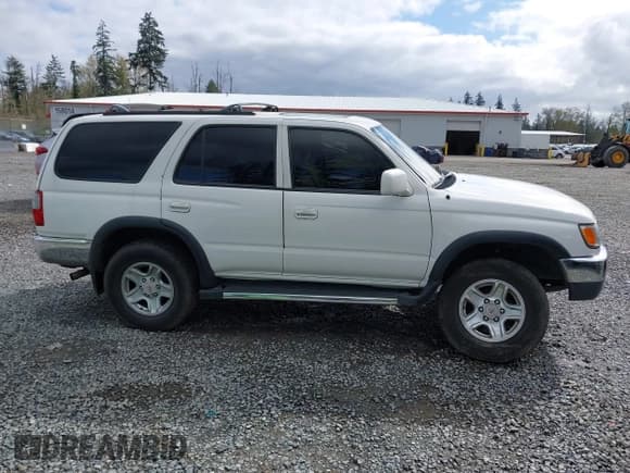 ✅ 1997 Toyota 4Runner SR5 • VIN: JT3HN86R3V0129421 • Lot: 41999736. Listed on IAAI with 154,067 mi. Free auction sales archive from the USA and detailed vehicle history report at DreamBid. Image 13.