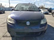 ✅ 2009 Suzuki SX4 FWD • VIN: JS2YC412096201401 • Лот: 70041875. Опубликован ранее на Copart с пробегом 115 142 миль. Бесплатный доступ к архиву аукционных продаж из США и подробный отчёт об истории автомобиля на DreamBid. Изображение 5.