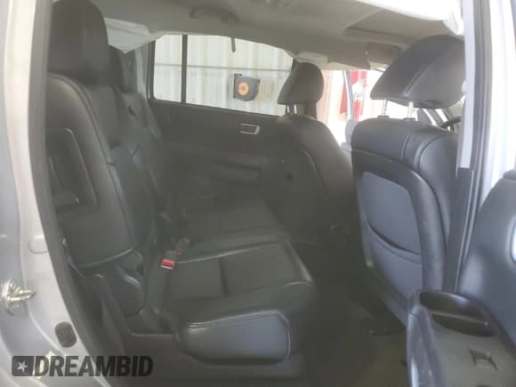 ✅ 2015 Honda Pilot Touring • VIN: 5FNYF4H98FB055169 • Lot: 80075885. Wystawiony na Copart z przebiegiem 142 787 mil. Bezpłatny archiwum sprzedaży aukcyjnych z USA i szczegółowy raport historii pojazdu na DreamBid. Zdjęcie 11.