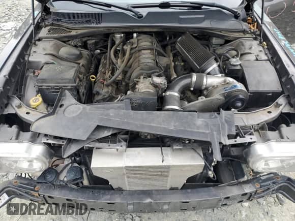 2013 Dodge Challenger R/T Plus z VIN 2C3CDYBT9DH629107, wystawiony jako Copart lot #62844584 z przebiegiem 121 108 mil mil oraz Szkoda całkowita • Salvage title. Historia ofert i sprzedaży dostępna na DreamBid. Obrazek 11.