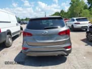 ✅ 2018 Hyundai Santa Fe 2.4L • VIN: 5NMZTDLB4JH107766 • Лот: 43043034. Опубликован ранее на IAAI с пробегом 93 208 миль. Бесплатный доступ к архиву аукционных продаж из США и подробный отчёт об истории автомобиля на DreamBid. Изображение 17.