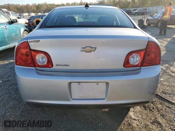 ✅ 2012 Chevrolet Malibu 1LS • VIN: 1G1ZB5E09CF357419 • Lot: 75650164. Listed on Copart with 150,496 mi. Free auction sales archive from the USA and detailed vehicle history report at DreamBid. Image 6.