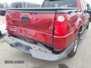 ✅ 2001 Ford Explorer Sport Trac • VIN: 1FMZU77E61UA87382 • Lot: 42461697. Wystawiony na IAAI z przebiegiem 386 659 mil. Bezpłatny archiwum sprzedaży aukcyjnych z USA i szczegółowy raport historii pojazdu na DreamBid. Zdjęcie 13.