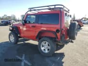 ✅ 2018 Jeep Wrangler Sahara • VIN: 1C4AJWBGXJL937095 • Lot: 42109205. Listed on Copart with 34,408 mi. Free auction sales archive from the USA and detailed vehicle history report at DreamBid. Image 2.