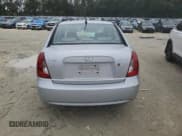 ✅ 2006 Hyundai Accent GLS • VIN: KMHCN46C06U047601 • Лот: 41873365. Опубликован ранее на Copart с пробегом 163 812 миль. Бесплатный доступ к архиву аукционных продаж из США и подробный отчёт об истории автомобиля на DreamBid. Изображение 6.