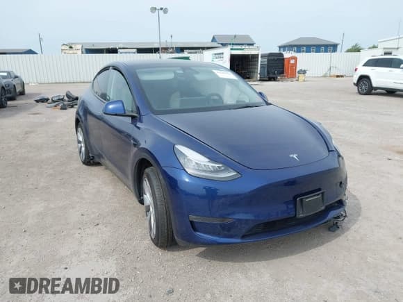 ✅ 2023 Tesla Model Y Long Range • VIN: 7SAYGDEE5PA076268 • Lot: 43140234. Wystawiony na IAAI z przebiegiem 26 918 mil. Bezpłatny archiwum sprzedaży aukcyjnych z USA i szczegółowy raport historii pojazdu na DreamBid. Zdjęcie 1.