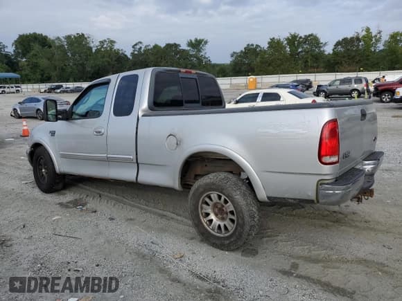 ✅ 2000 Ford F-150 XL • VIN: 1FTRX18L9YNA77620 • Lot: 69785785. Wystawiony na Copart z przebiegiem Nie podano. Bezpłatny archiwum sprzedaży aukcyjnych z USA i szczegółowy raport historii pojazdu na DreamBid. Zdjęcie 2.