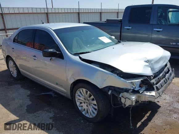 ✅ 2011 Ford Fusion Hybrid • VIN: 3FADP0L32BR345235 • Lot: 42322127. Listed on IAAI with 120,968 mi. Free auction sales archive from the USA and detailed vehicle history report at DreamBid. Image 1.