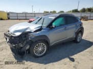✅ 2018 Hyundai Kona SEL • VIN: KM8K22AA6JU168012 • Лот: 69510784. Опубликован ранее на Copart с пробегом 32 427 миль. Бесплатный доступ к архиву аукционных продаж из США и подробный отчёт об истории автомобиля на DreamBid. Изображение 1.