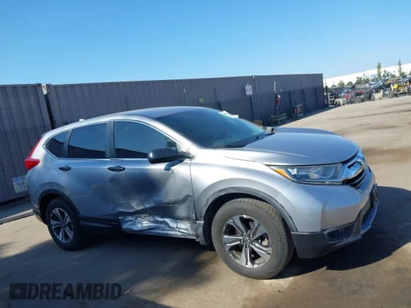 ✅ 2018 Honda CR-V LX • VIN: 2HKRW5H31JH426401 • Lot: 43635265. Listed on IAAI with 39,426 mi. Free auction sales archive from the USA and detailed vehicle history report at DreamBid. Image 14.