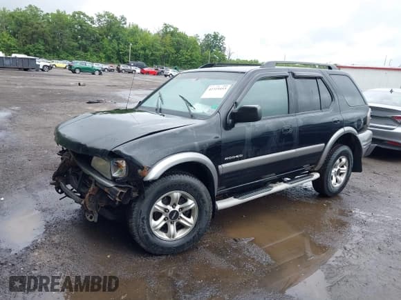 ✅ 2003 Isuzu Rodeo • VIN: 4S2DM58W234312253 • Лот: 42319453. Опубликован ранее на IAAI с пробегом 187 939 миль. Бесплатный доступ к архиву аукционных продаж из США и подробный отчёт об истории автомобиля на DreamBid. Изображение 2.
