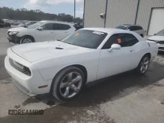 ✅ 2012 Dodge Challenger SXT • VIN: 2C3CDYAG6CH292897 • Lot: 78373494. Wystawiony na Copart z przebiegiem 154 703 mil. Bezpłatny archiwum sprzedaży aukcyjnych z USA i szczegółowy raport historii pojazdu na DreamBid. Zdjęcie 1.