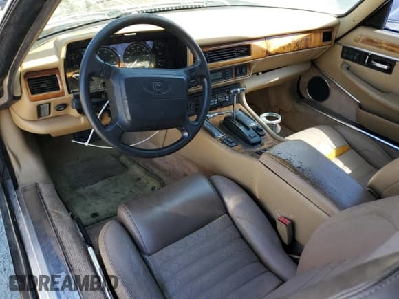 ✅ 1994 Jaguar XJS • VIN: SAJNX4748RC188121 • Лот: 51699415. Опубликован ранее на Copart с пробегом 137 102 миль. Бесплатный доступ к архиву аукционных продаж из США и подробный отчёт об истории автомобиля на DreamBid. Изображение 8.