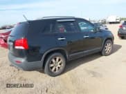 ✅ 2012 Kia Sorento LX • VIN: 5XYKT4A2XCG293038 • Lot: 42877845. Listed on IAAI with 317,059 mi. Free auction sales archive from the USA and detailed vehicle history report at DreamBid. Image 4.