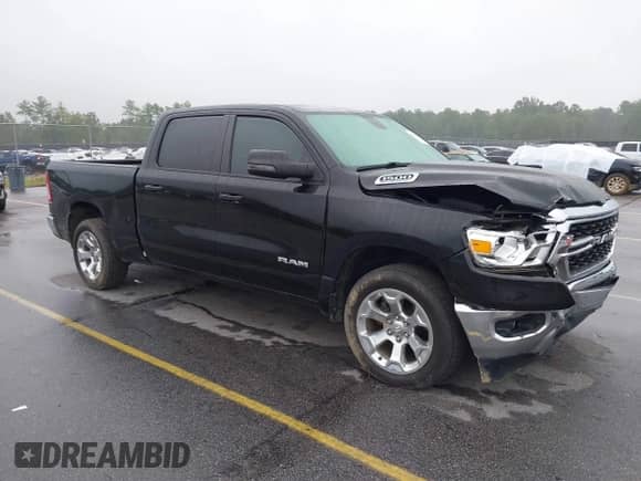 2023 Ram 1500 Lone Star with VIN 1C6RREMT4PN664918, listed as a IAAI auction lot 42942757 with 38,062 mi miles and . Bid and sale history available at DreamBid. Image 1.