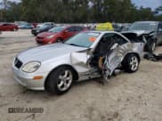 ✅ 2003 Mercedes-Benz SLK 320 • VIN: WDBKK65F43F280539 • Лот: 88744765. Опубликован ранее на Copart с пробегом 165 117 миль. Бесплатный доступ к архиву аукционных продаж из США и подробный отчёт об истории автомобиля на DreamBid. Изображение 1.