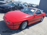 ✅ 1988 Mazda RX-7 • VIN: JM1FC3511J0107807 • Lot: 42304723. Wystawiony na IAAI z przebiegiem 134 369 mil. Bezpłatny archiwum sprzedaży aukcyjnych z USA i szczegółowy raport historii pojazdu na DreamBid. Zdjęcie 2.