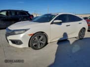 ✅ 2016 Honda Civic Touring • VIN: 19XFC1F97GE022799 • Lot: 94067465. Listed on Copart with 155,465 mi. Free auction sales archive from the USA and detailed vehicle history report at DreamBid. Image 1.