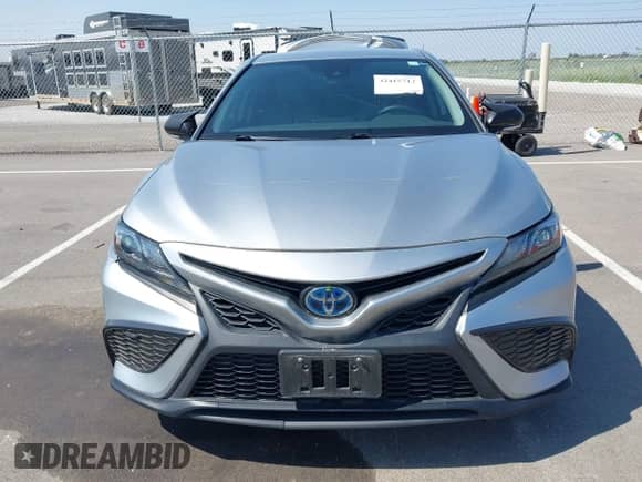 2021 Toyota Camry Hybrid SE z VIN 4T1G31AKXMU562641, wystawiony jako IAAI lot #42415712 z przebiegiem 71 085 mil mil oraz . Historia ofert i sprzedaży dostępna na DreamBid. Obrazek 12.