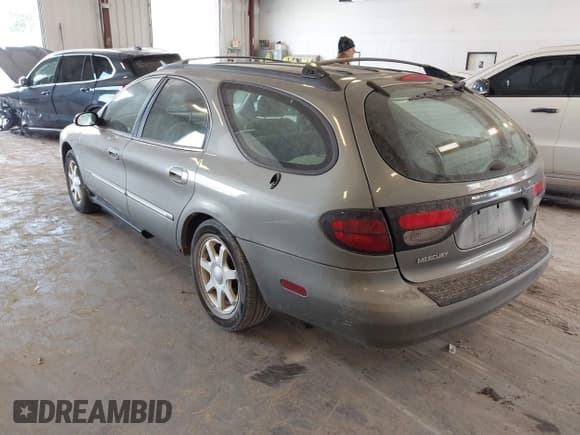 ✅ 2003 Mercury Sable LS Premium • VIN: 1MEHM59S73A620690 • Lot: 42740596. Listed on IAAI with 92,891 mi. Free auction sales archive from the USA and detailed vehicle history report at DreamBid. Image 3.
