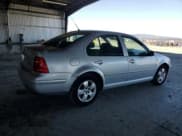 ✅ 2003 Volkswagen Jetta GLS • VIN: 3VWSP69M53M072355 • Lot: 87067915. Listed on Copart with 156,496 mi. Free auction sales archive from the USA and detailed vehicle history report at DreamBid. Image 3.