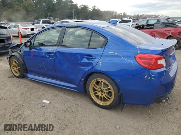 ✅ 2015 Subaru WRX Premium • VIN: JF1VA1D64F9834077 • Lot: 90986915. Listed on Copart with 188,106 mi. Free auction sales archive from the USA and detailed vehicle history report at DreamBid. Image 2.