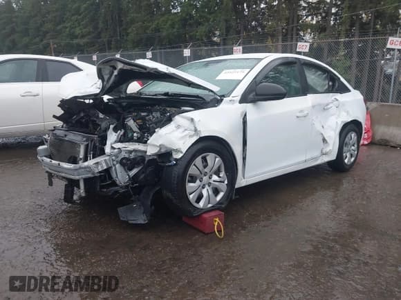 ✅ 2013 Chevrolet Cruze LS • VIN: 1G1PA5SG5D7293757 • Lot: 43527179. Listed on IAAI with 185,139 mi. Free auction sales archive from the USA and detailed vehicle history report at DreamBid. Image 2.