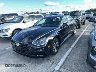 ✅ 2023 Hyundai Sonata SEL • VIN: KMHL64JA1PA303072 • Лот: 91112995. Опубликован ранее на Copart с пробегом 21 733 миль. Бесплатный доступ к архиву аукционных продаж из США и подробный отчёт об истории автомобиля на DreamBid. Изображение 2.