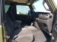 ✅ 2023 Jeep Wrangler Sport S • VIN: 1C4HJXAG0PW677979 • Lot: 43450033. Listed on IAAI with 8,803 mi. Free auction sales archive from the USA and detailed vehicle history report at DreamBid. Image 5.