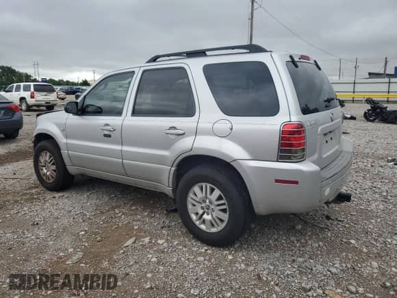 2006 Mercury Mariner Luxury z VIN 4M2CU56196KJ17209, wystawiony jako Copart lot #58450665 z przebiegiem 239 728 mil mil oraz Szkoda całkowita • Salvage title. Historia ofert i sprzedaży dostępna na DreamBid. Obrazek 2.