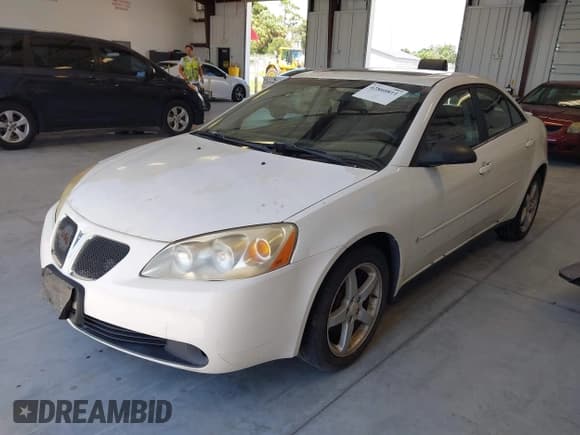 ✅ 2006 Pontiac G6 6-Cyl • VIN: 1G2ZG558764234804 • Lot: 42860811. Listed on IAAI with Not provided. Free auction sales archive from the USA and detailed vehicle history report at DreamBid. Image 2.