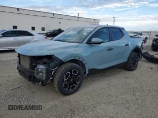 ✅ 2024 Hyundai Santa Cruz SEL • VIN: 5NTJBDAE1RH097436 • Лот: 84412005. Опубликован ранее на Copart с пробегом 28 264 миль. Бесплатный доступ к архиву аукционных продаж из США и подробный отчёт об истории автомобиля на DreamBid. Изображение 1.