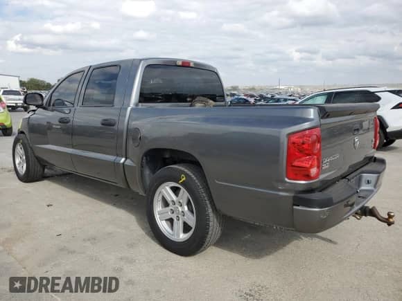 2008 Dodge Dakota SLT with VIN 1D7HE48N58S578824, listed as a Copart auction lot 78477474 with 64,557 mi miles and Salvage title. Bid and sale history available at DreamBid. Image 2.