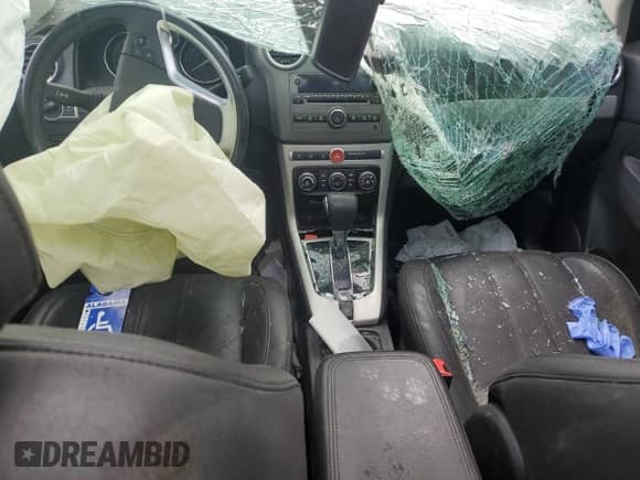 2012 Chevrolet Captiva Sport LTZ z VIN 3GNFL4E57CS638280, wystawiony jako Copart lot #73817564 z przebiegiem Nie podano mil oraz Szkoda całkowita • Salvage title. Historia ofert i sprzedaży dostępna na DreamBid. Obrazek 8.