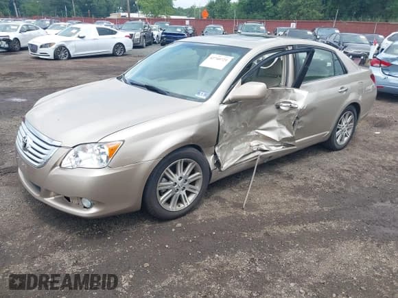 ✅ 2009 Toyota Avalon XL • VIN: 4T1BK36B39U327538 • Lot: 42740721. Wystawiony na IAAI z przebiegiem 127 683 mil. Bezpłatny archiwum sprzedaży aukcyjnych z USA i szczegółowy raport historii pojazdu na DreamBid. Zdjęcie 2.