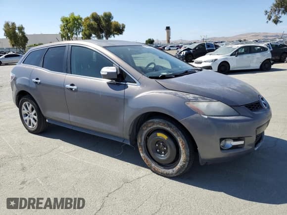✅ 2009 Mazda CX-7 Grand Touring • VIN: JM3ER29L090216696 • Lot: 56958805. Listed on Copart with 145,360 mi. Free auction sales archive from the USA and detailed vehicle history report at DreamBid. Image 4.
