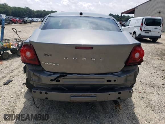 2013 Dodge Avenger SE с VIN 1C3CDZABXDN593904, выставлен на аукционе Copart как лот 62848555 с пробегом Не указан миль и Списание • Salvage title. История ставок и продаж доступна на DreamBid. Изображение 6.