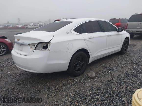 ✅ 2016 Chevrolet Impala LS • VIN: 2G11X5SA7G9159951 • Lot: 41914109. Listed on IAAI with 135,432 mi. Free auction sales archive from the USA and detailed vehicle history report at DreamBid. Image 4.