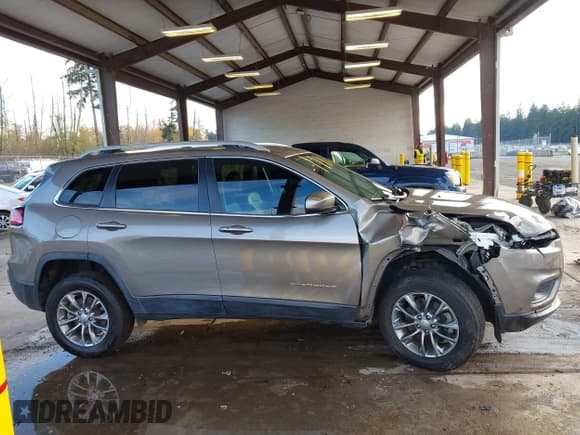 ✅ 2019 Jeep Cherokee Latitude Plus • VIN: 1C4PJMLXXKD394260 • Lot: 43667606. Listed on IAAI with 91,794 mi. Free auction sales archive from the USA and detailed vehicle history report at DreamBid. Image 14.