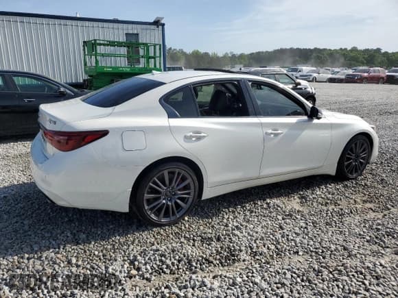 ✅ 2023 Infiniti Q50 Red Sport 400 • VIN: JN1FV7DP5PM570593 • Lot: 52403665. Listed on Copart with 12,261 mi. Free auction sales archive from the USA and detailed vehicle history report at DreamBid. Image 3.